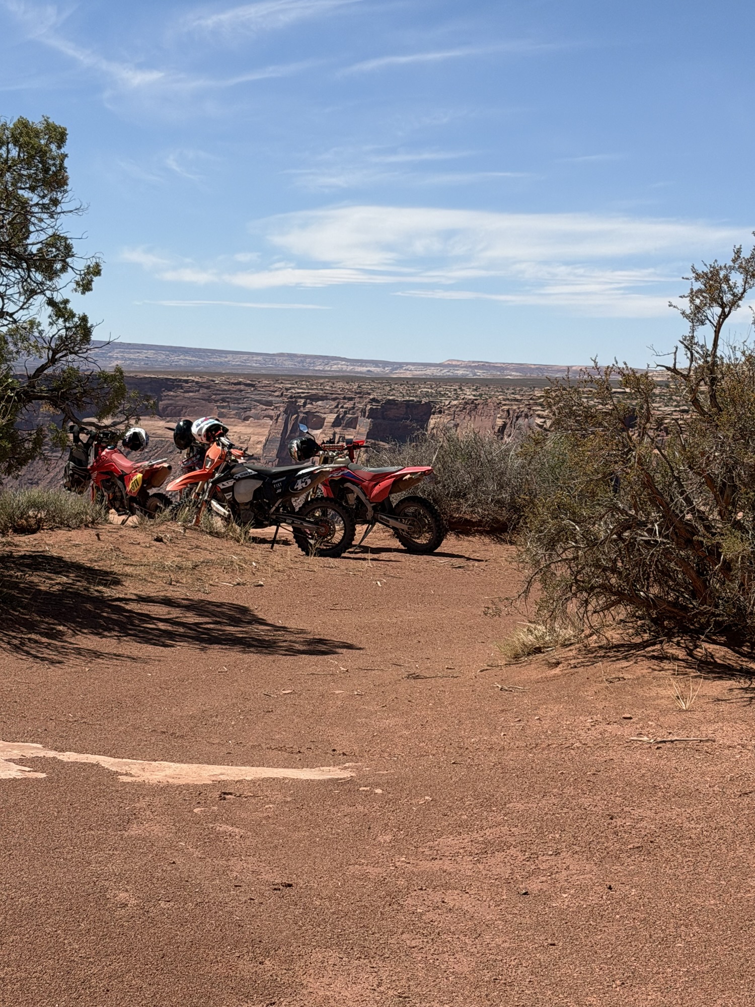 Motorcycles parked along edge of Hell Roaring Canyon, Moab, UT