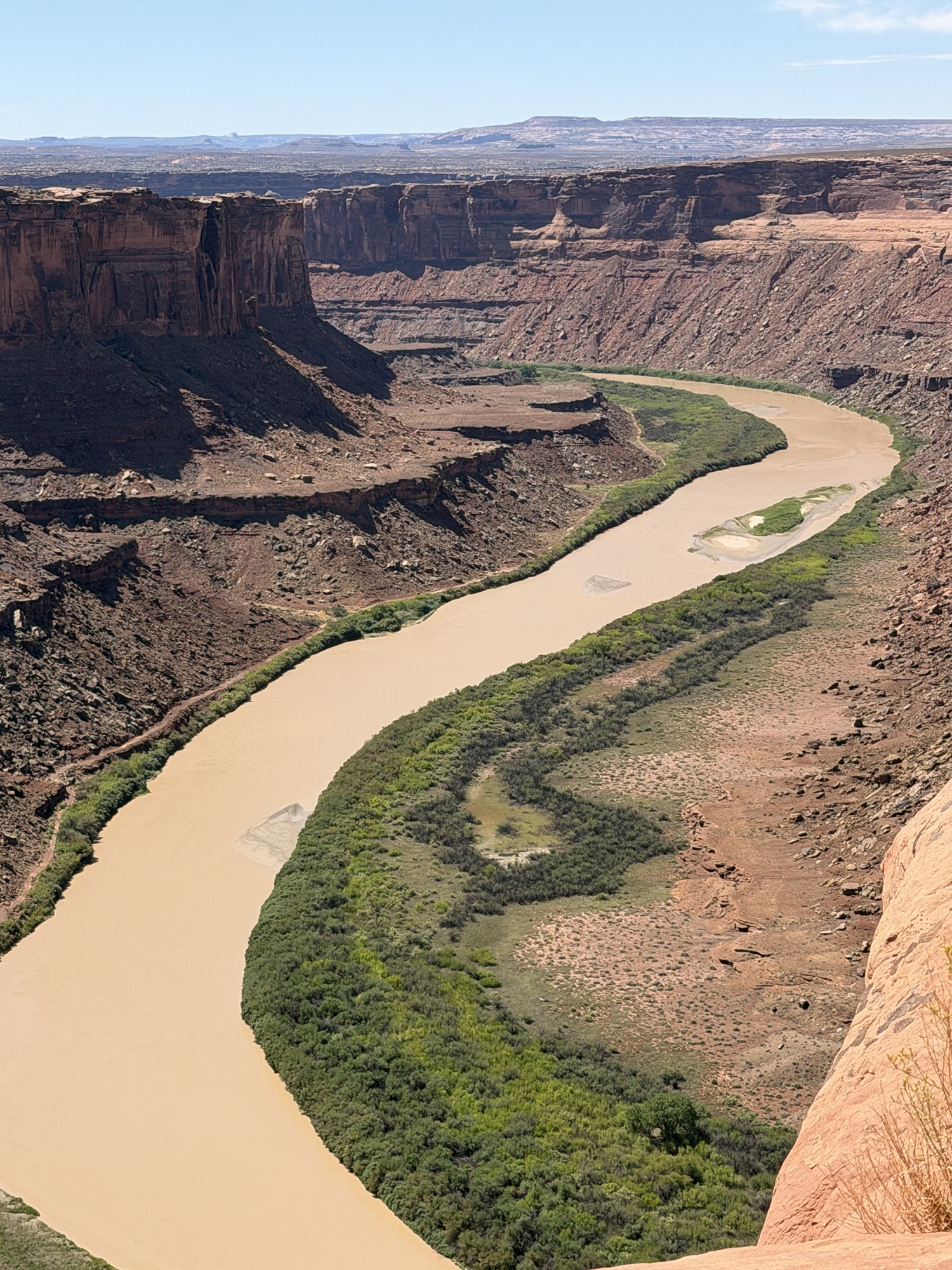 Looking down at Green River at edge of Hell Roaring Canyon, Moab, UT